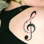 tatuaje sol nota musical 3 - tatuajes del sol