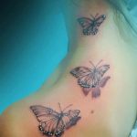 tattoo mariposa cuello flores 5 - tatuajes de mariposas